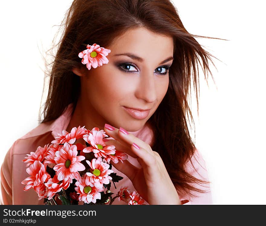 Young beautiful woman with pink flower