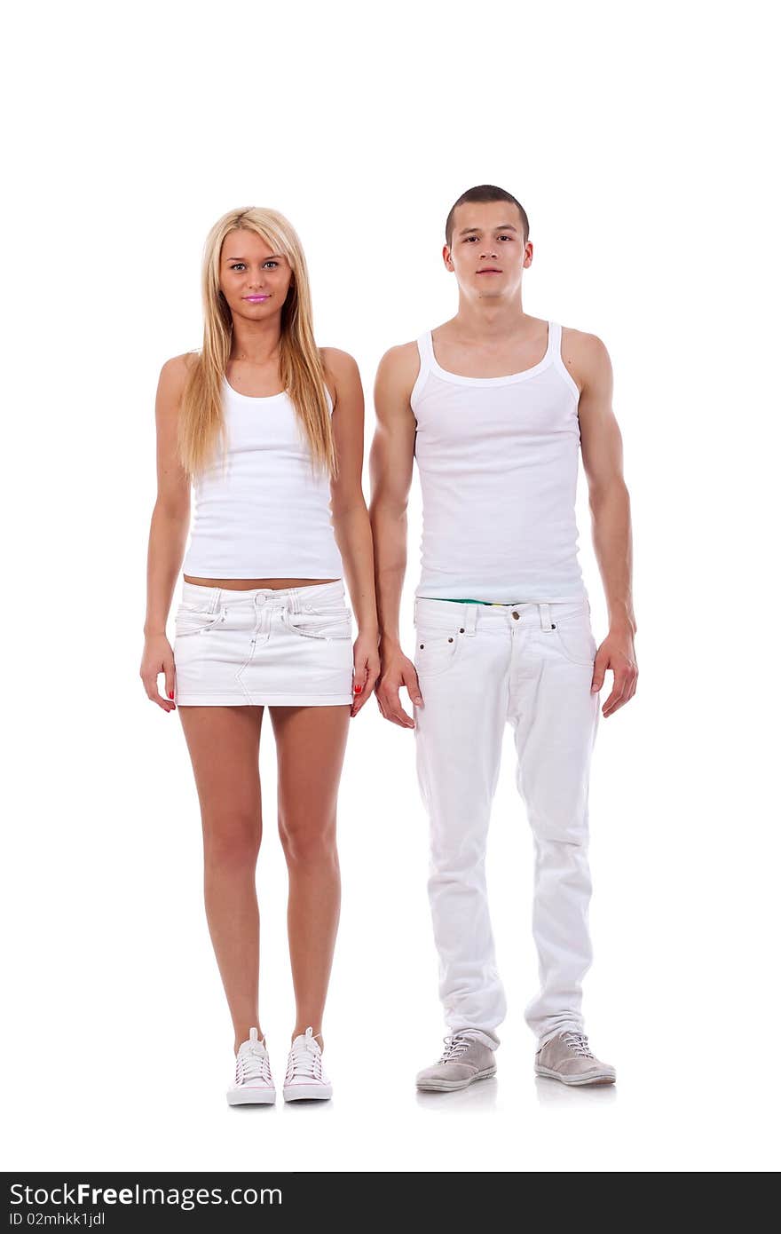 Picture of a young couple standing next to each other on white