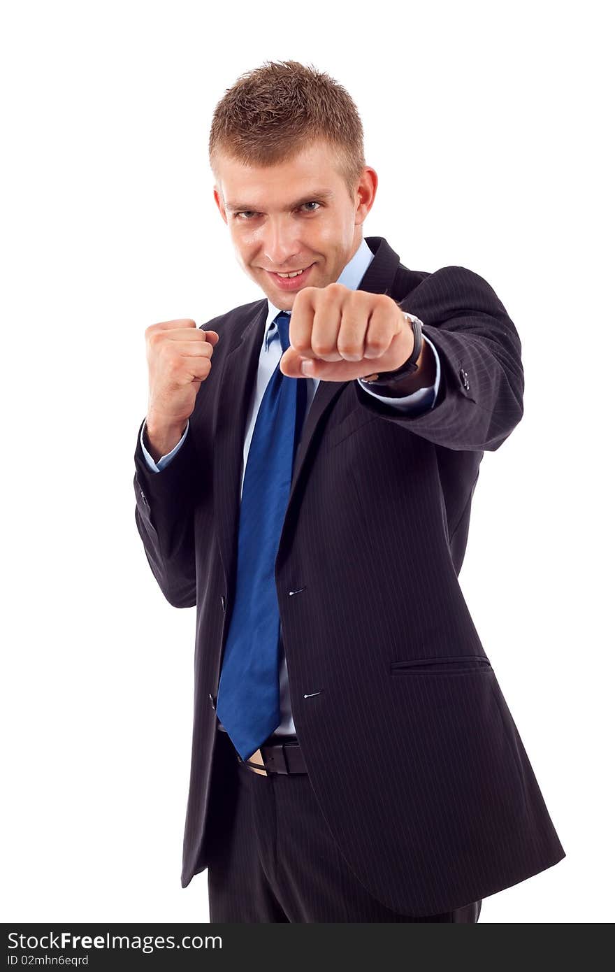 A bisiness man in a combat stance, isolated on a white background