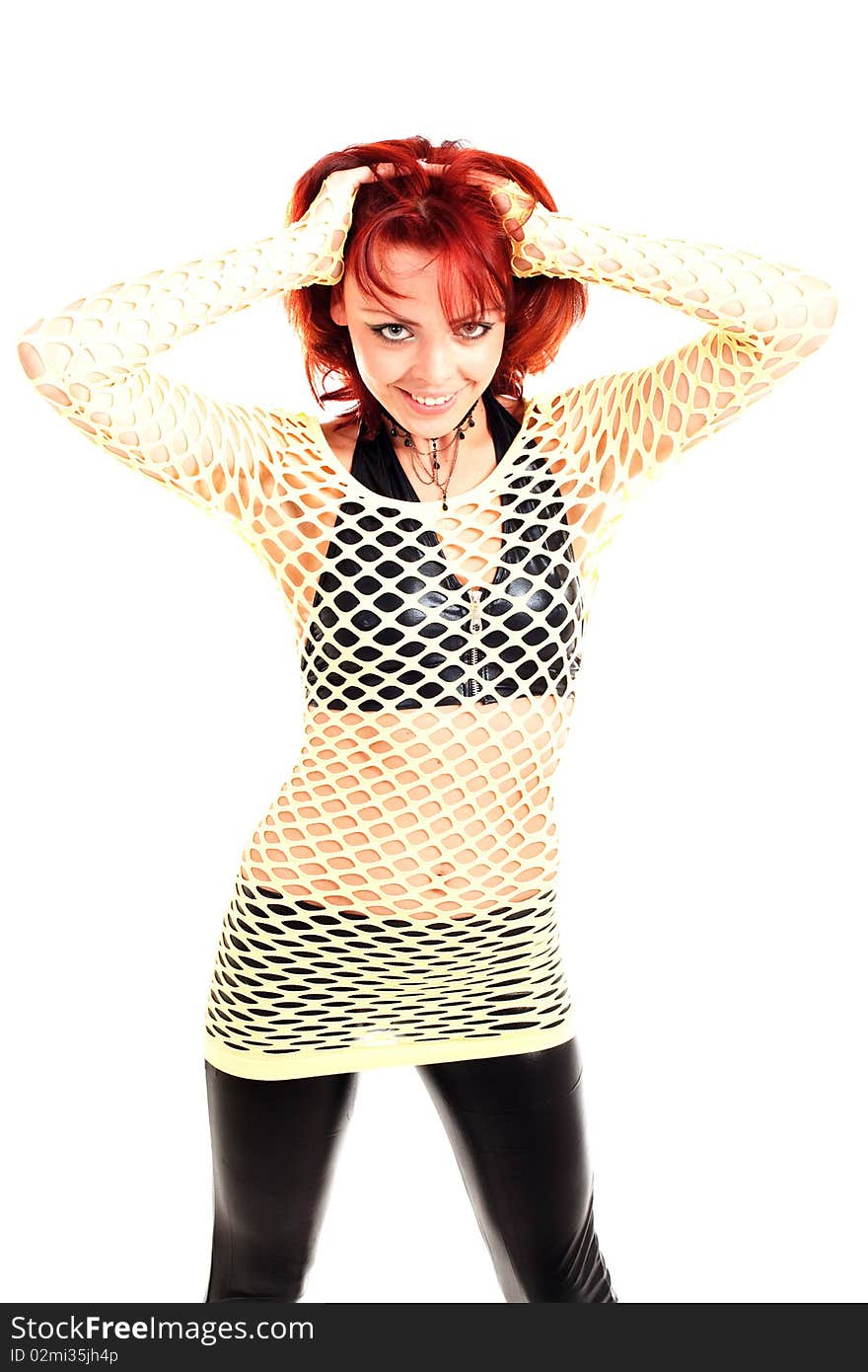 Young beautiful fashion model with red hair and a fishnet shirt. Young beautiful fashion model with red hair and a fishnet shirt.