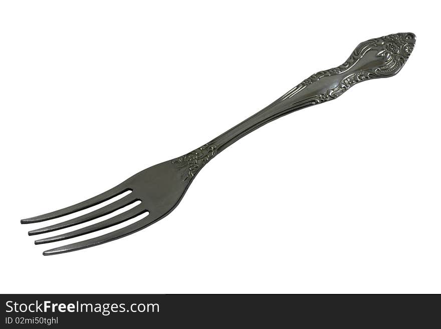 The metal fork on the white background