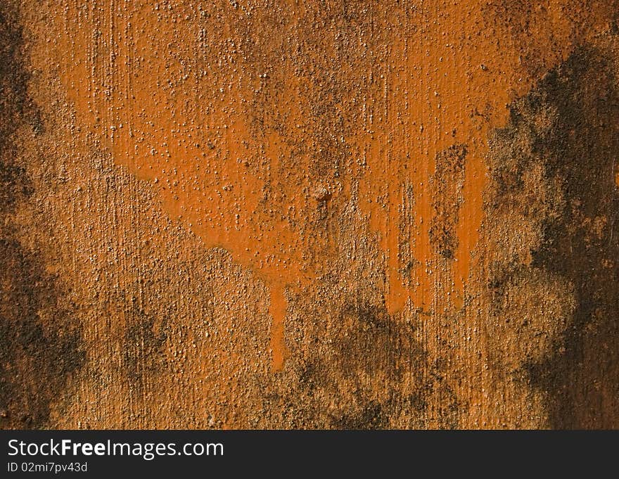 Orange painted grunge wall