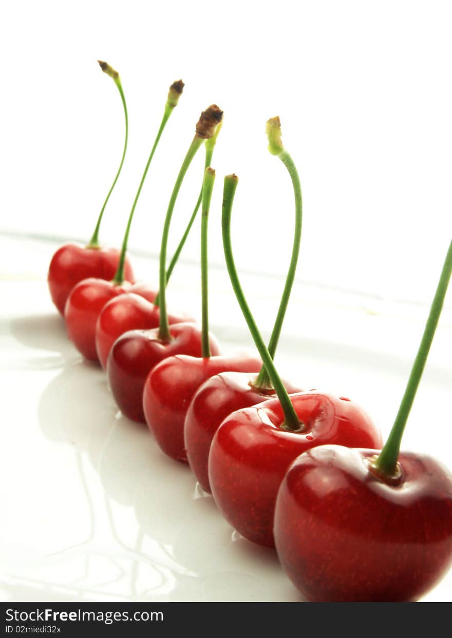 Cherries in a straight,red fruits