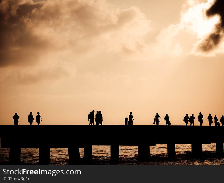 People walking on dock in Grand Turk. People walking on dock in Grand Turk