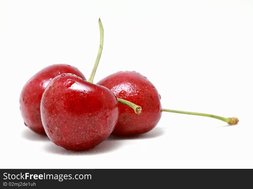 Cherry in the bowl with white background. Cherry in the bowl with white background.