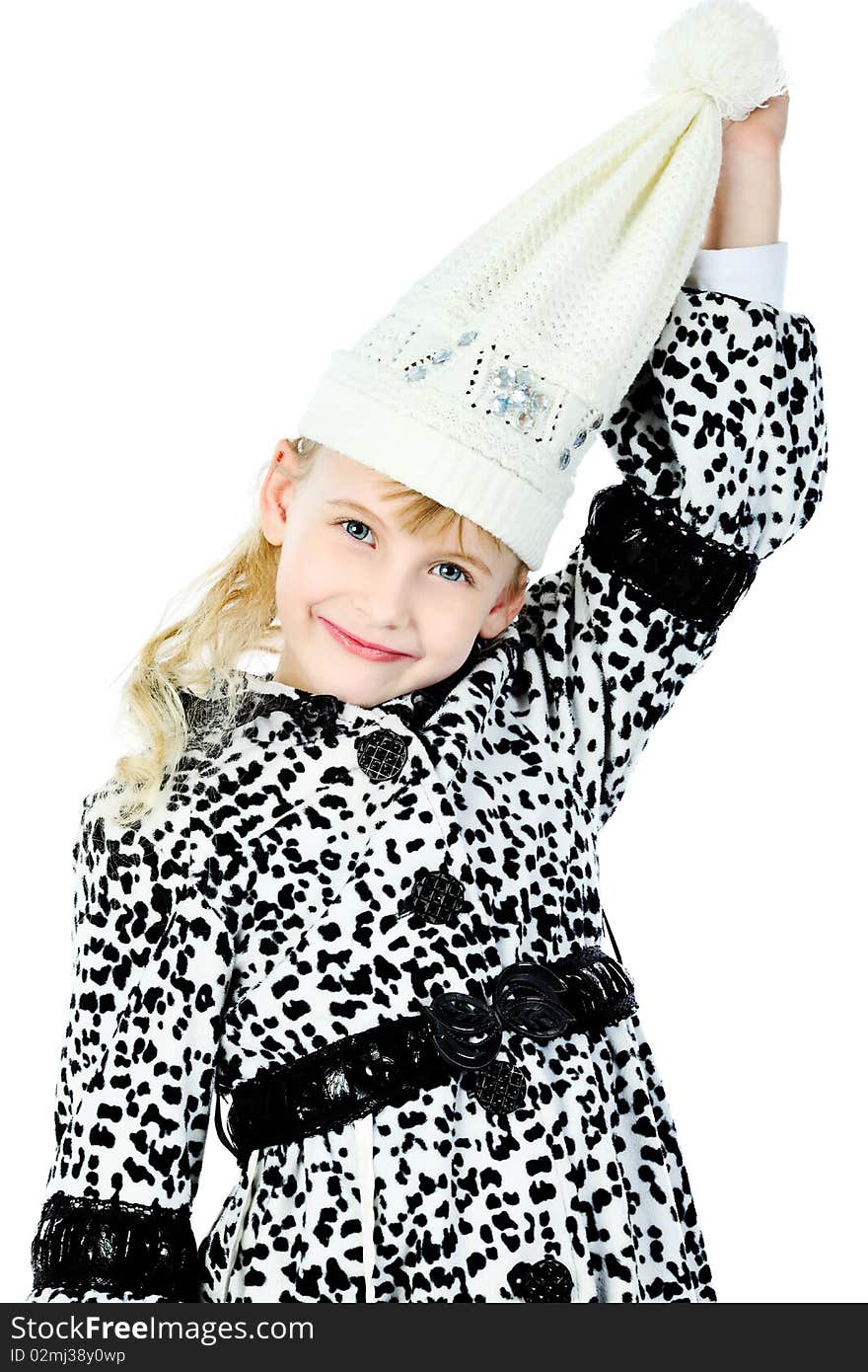 Portrait of a cute girl in a coat and cap. Isolated over white background. Portrait of a cute girl in a coat and cap. Isolated over white background.