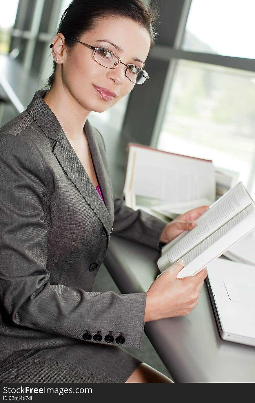 Business woman working at a desk