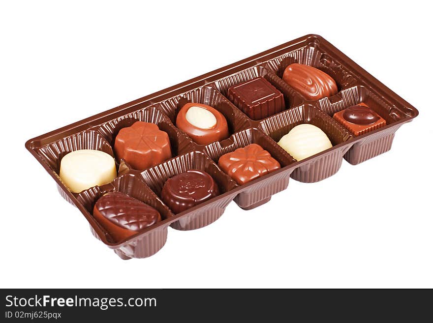 Box of assorted chocolates on white background