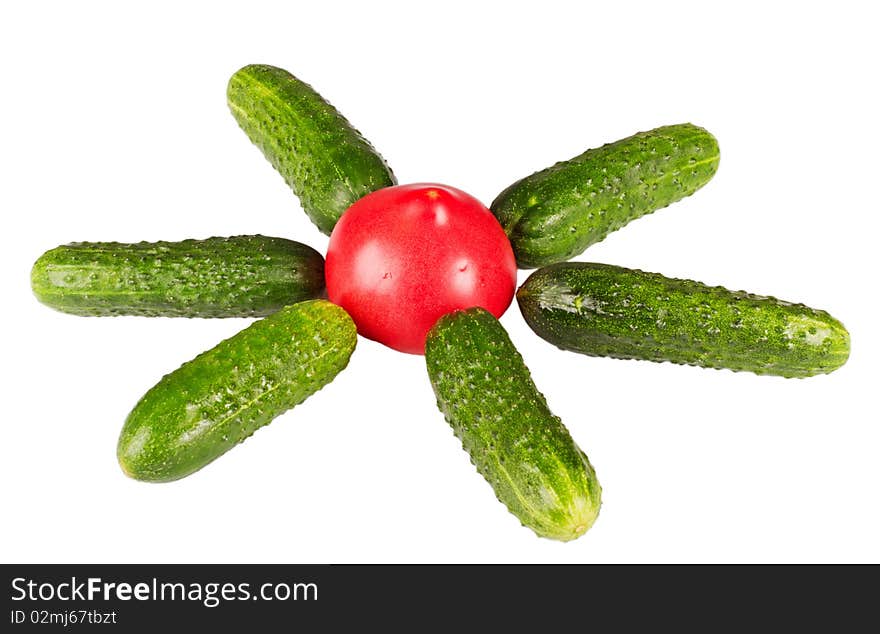 One tomato and six cucumbers sun on white background. One tomato and six cucumbers sun on white background