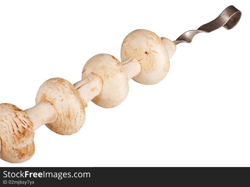 Grilled button mushrooms isolated on white