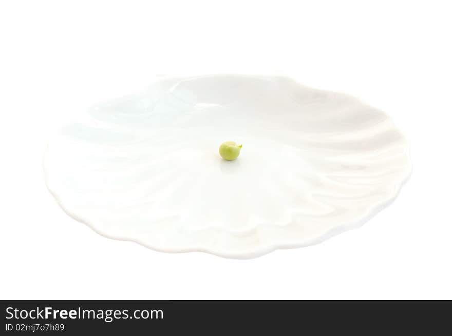 Pea on a white plate