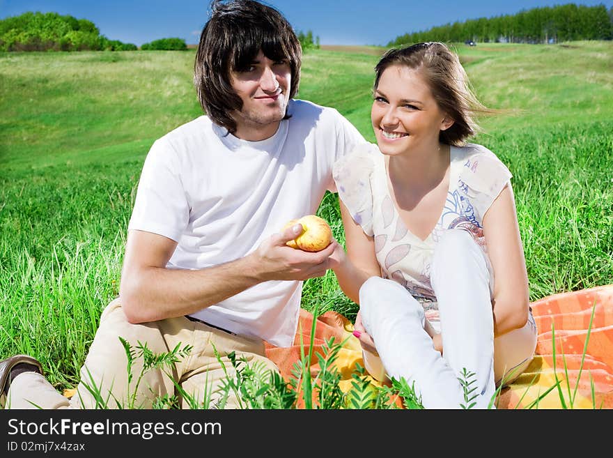 Boy and beautiful girl with apples. Boy and beautiful girl with apples