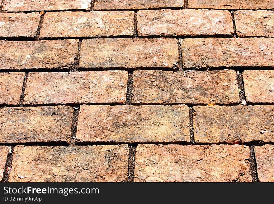 Abstract background with old brick way.