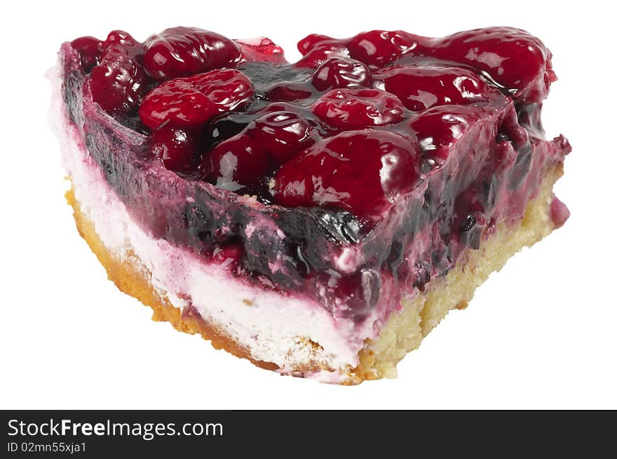 Small berries tart piece macro shot isolated over white background