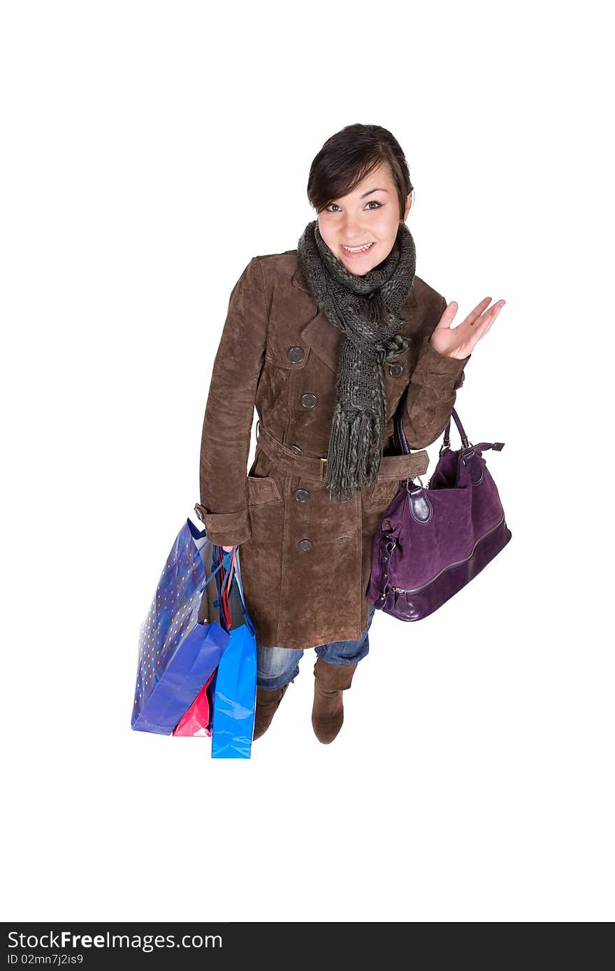 Young adult brunette woman with shopping bags