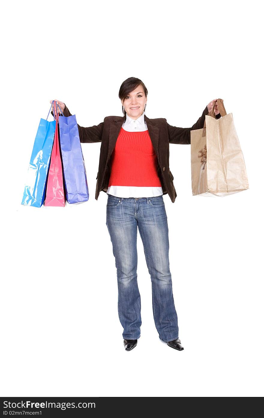 Young adult brunette woman with shopping bags