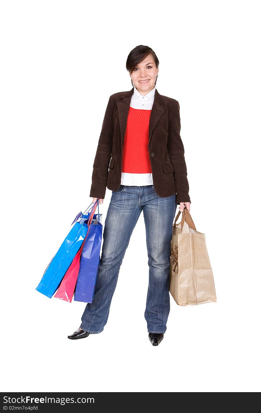 Young adult brunette woman with shopping bags