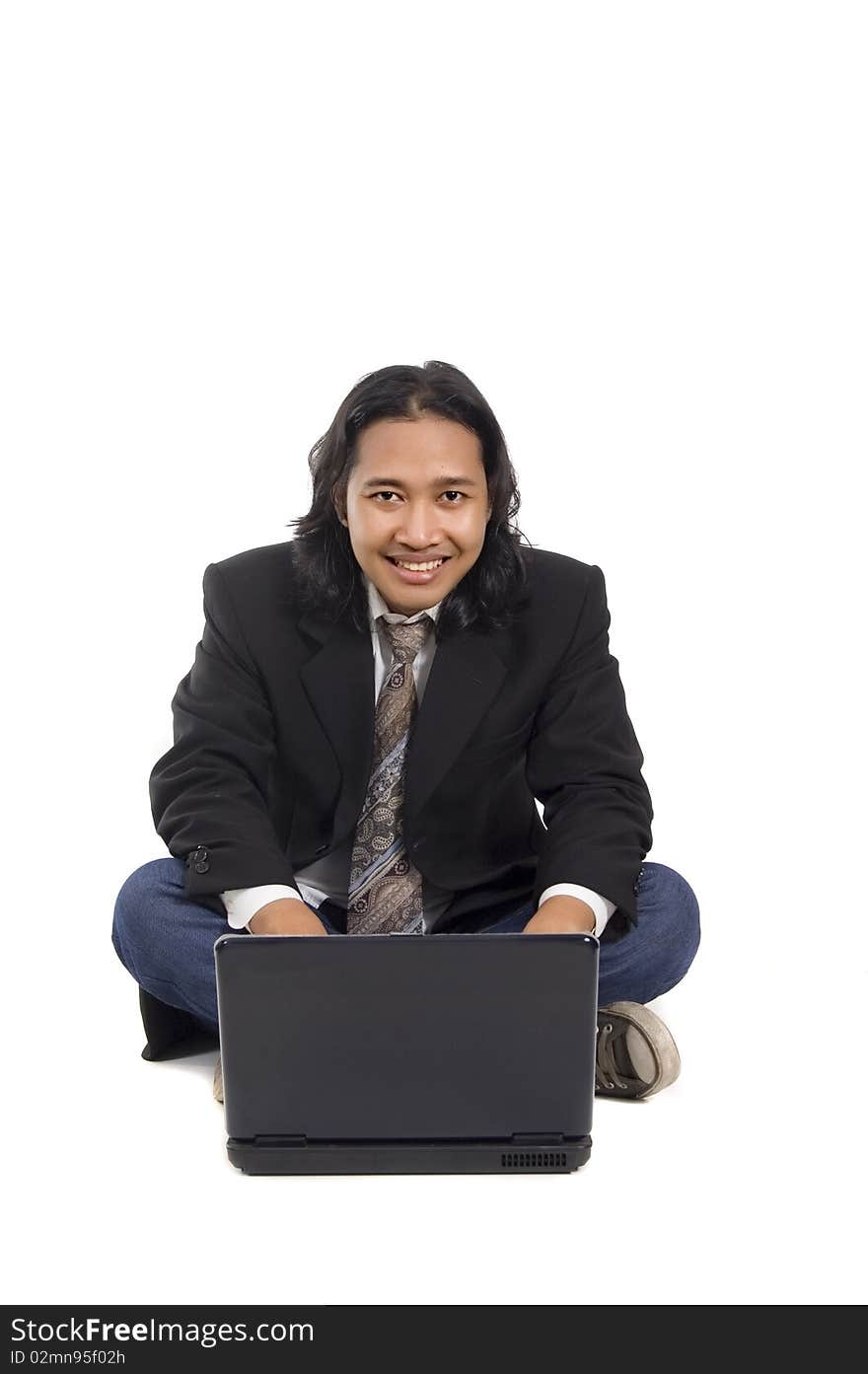 Long hair man sit on the floor, working with laptop, isolated on white. Long hair man sit on the floor, working with laptop, isolated on white