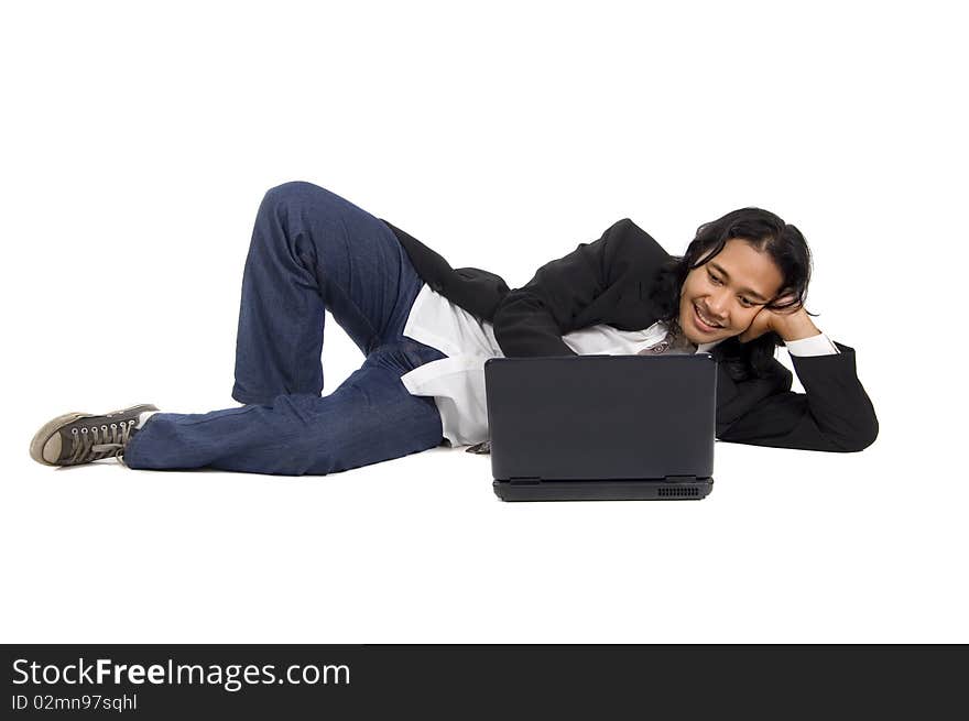 Long hair man laying on the floor, working with laptop, isolated on white. Long hair man laying on the floor, working with laptop, isolated on white