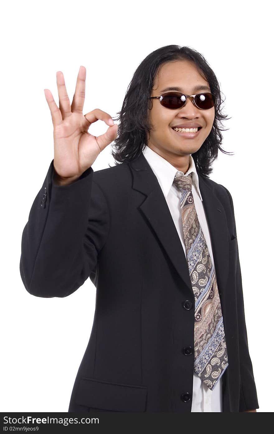 Long hair man in business suit give ok sign isolated on white background