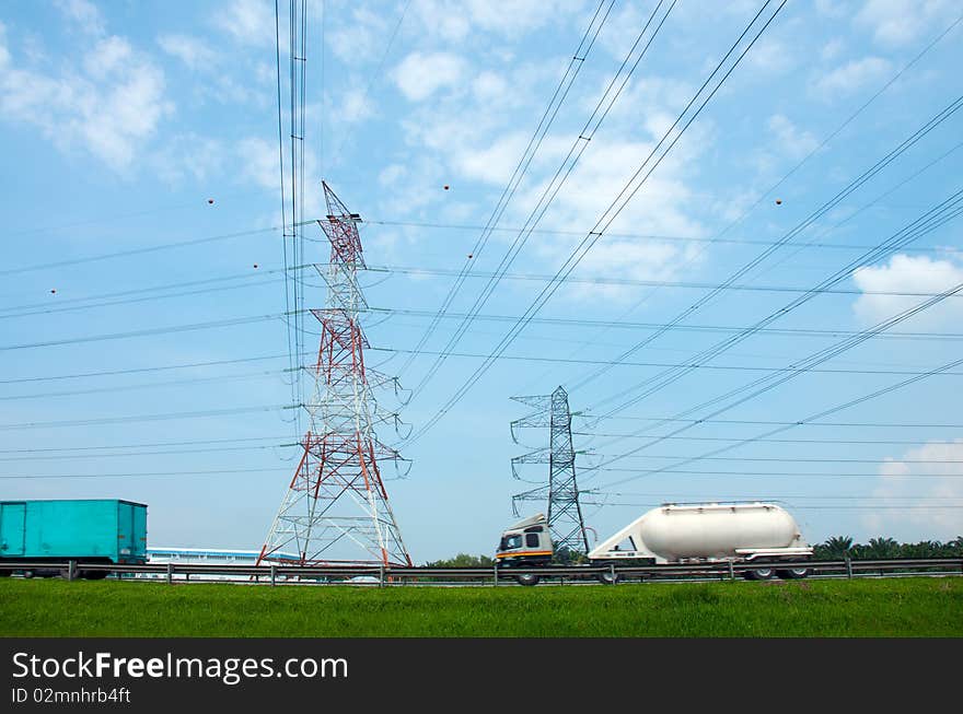 Electricity pylon with cables across the road. Electricity pylon with cables across the road