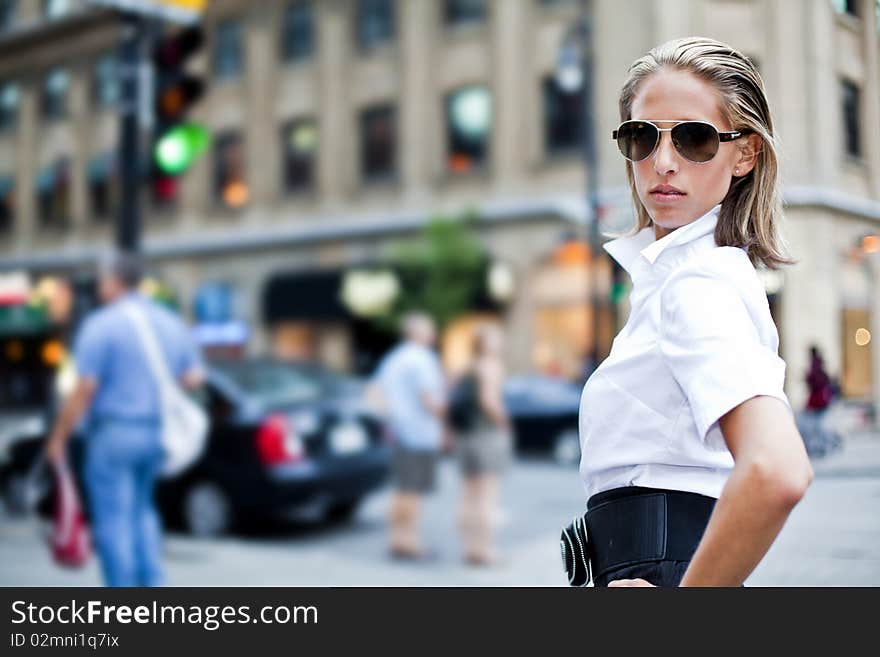 Beautiful businesswomen in the city going to work. Beautiful businesswomen in the city going to work