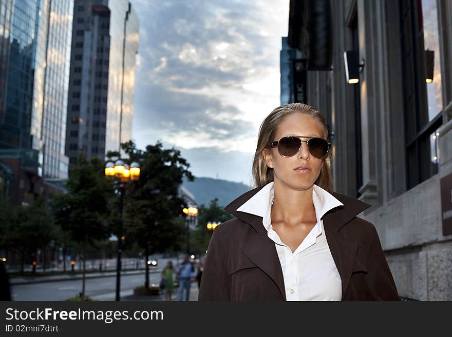 Beautiful businesswomen in the city going to work