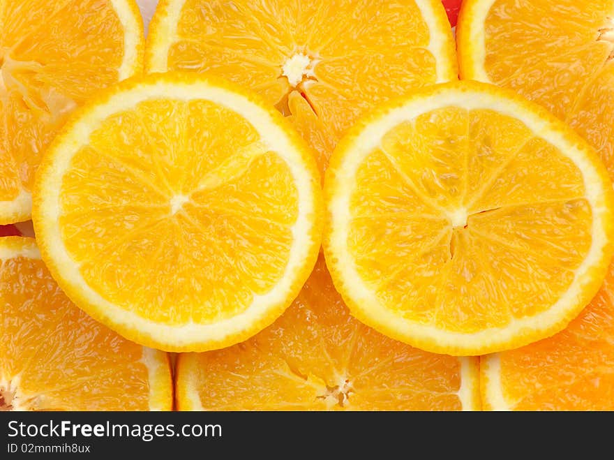 Background of pieces of juicy orange