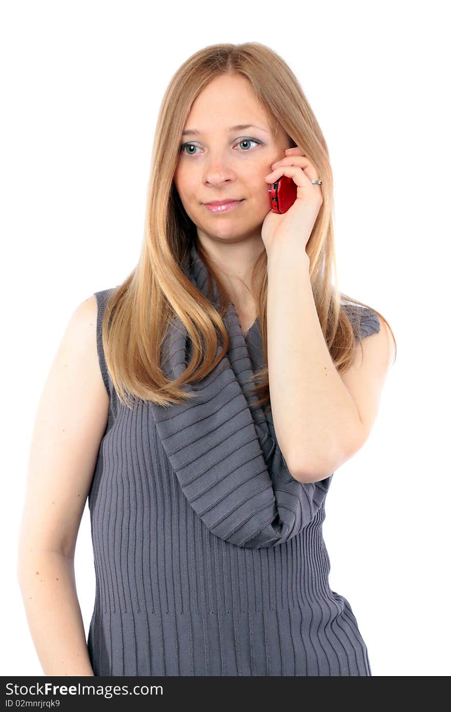 Young woman with long blond hair talking on phone