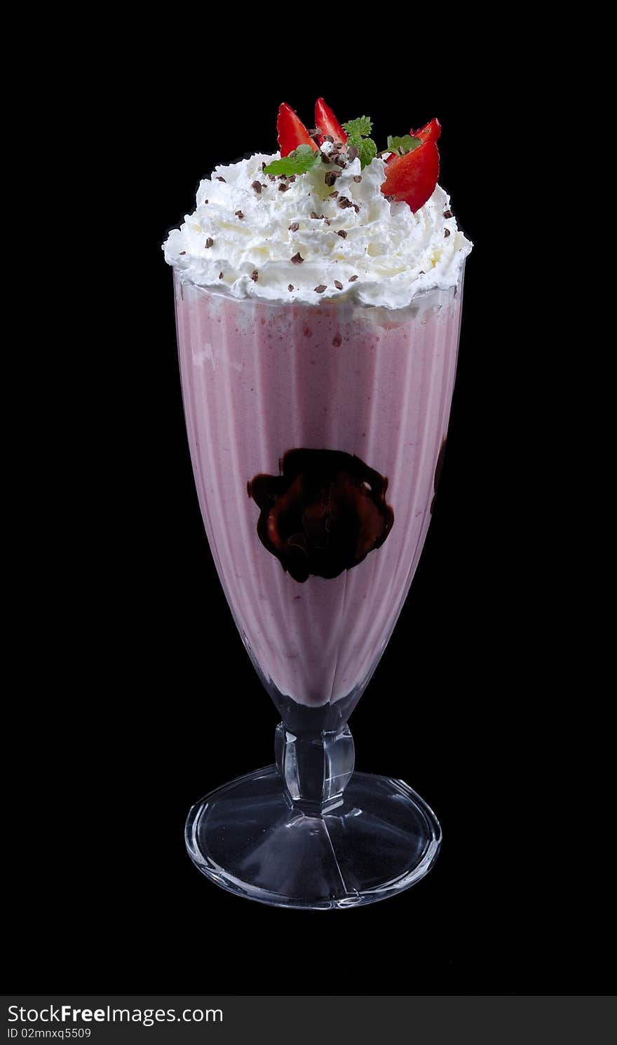 Strawberry shake in wineglass on white