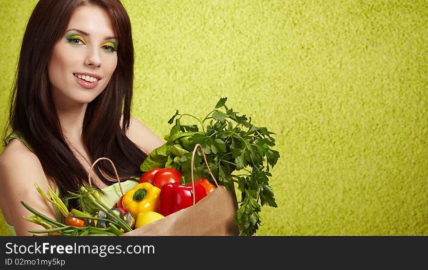 Woman with fruits and vegetables. Woman with fruits and vegetables