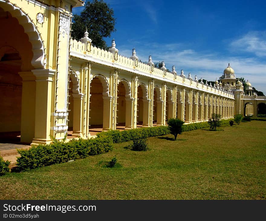 A beautiful and long wall of a Mysore palace in India. A beautiful and long wall of a Mysore palace in India.