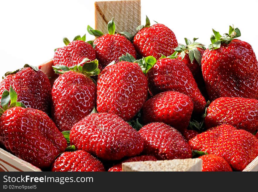 Fresh Ripe Perfect Strawberries in wooden box