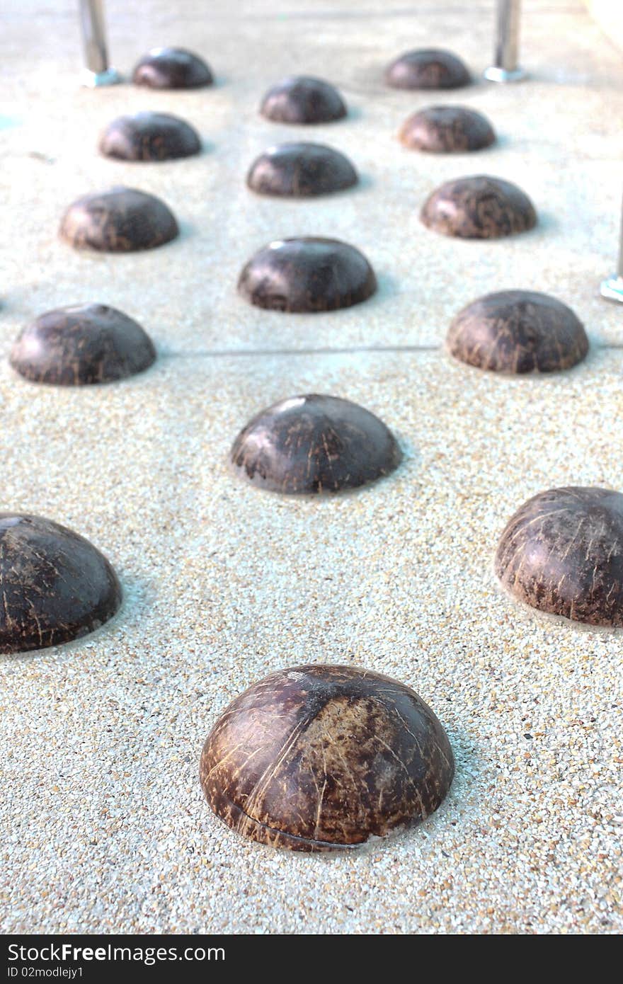 Coconut shell for foot massage.