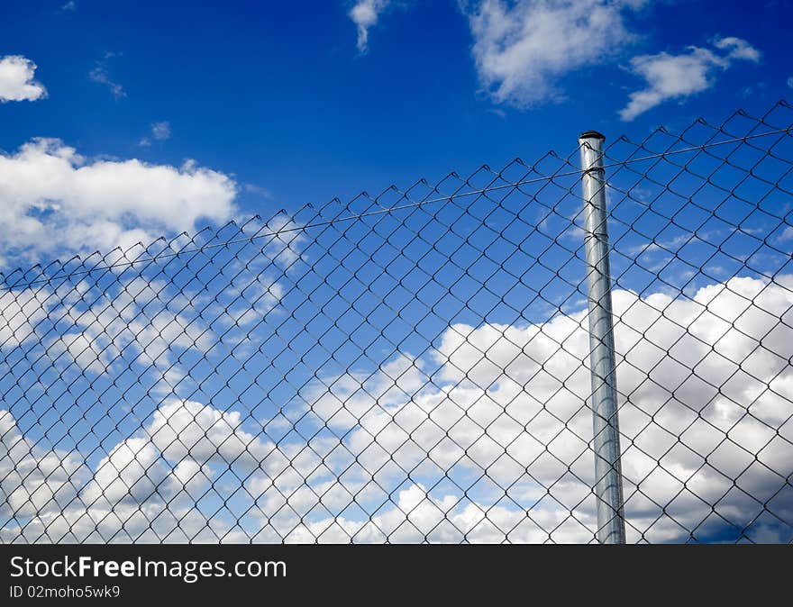 Fence And Sky