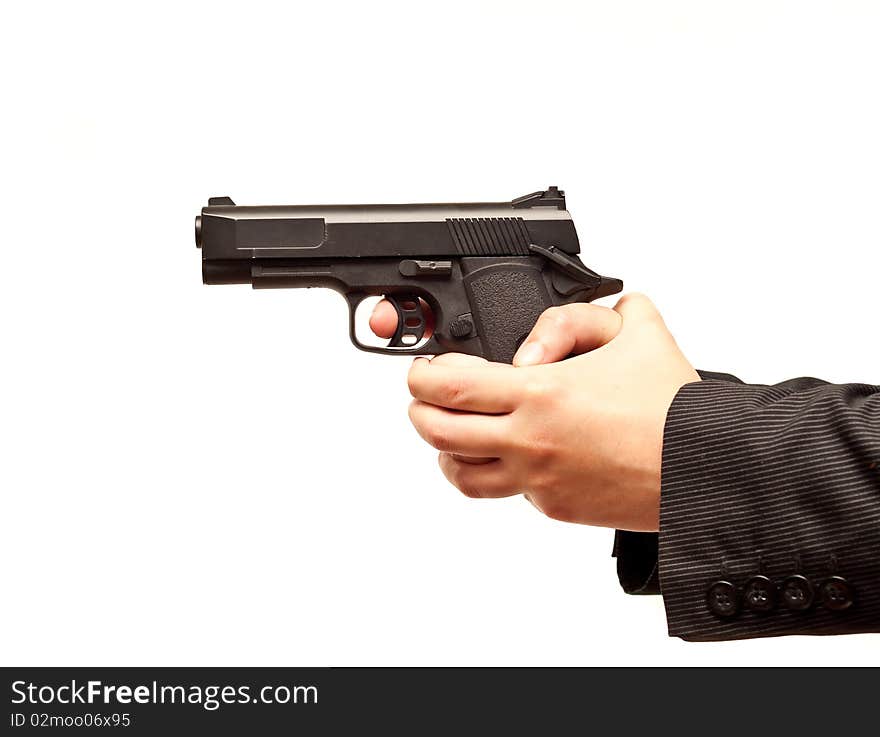 Female Hands Holding Gun Ready to Fire. Female Hands Holding Gun Ready to Fire