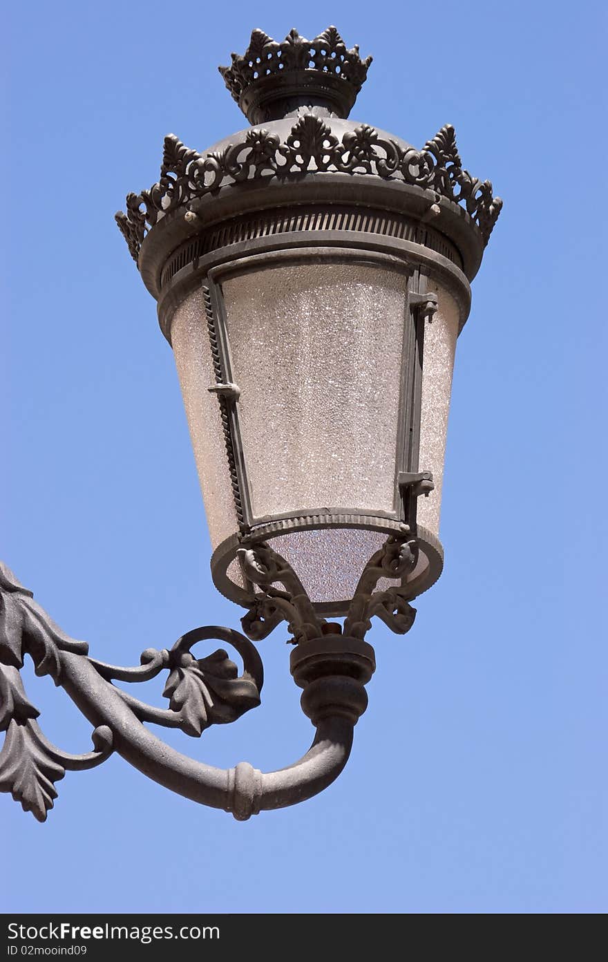 Old Black Street Lamp Against Sky