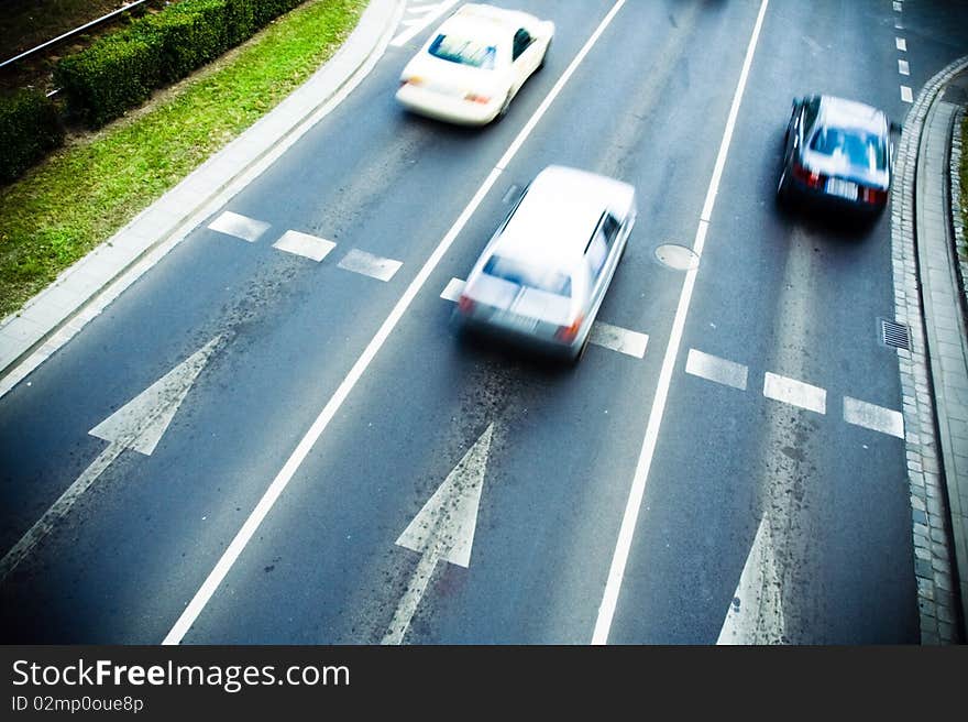 Motion blur of cars on city street. Motion blur of cars on city street