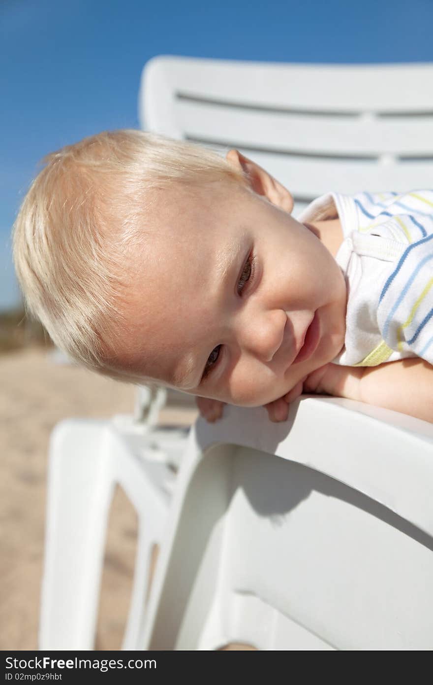 Little Child In Beach Chair