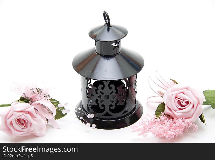 Black metal lantern with roses