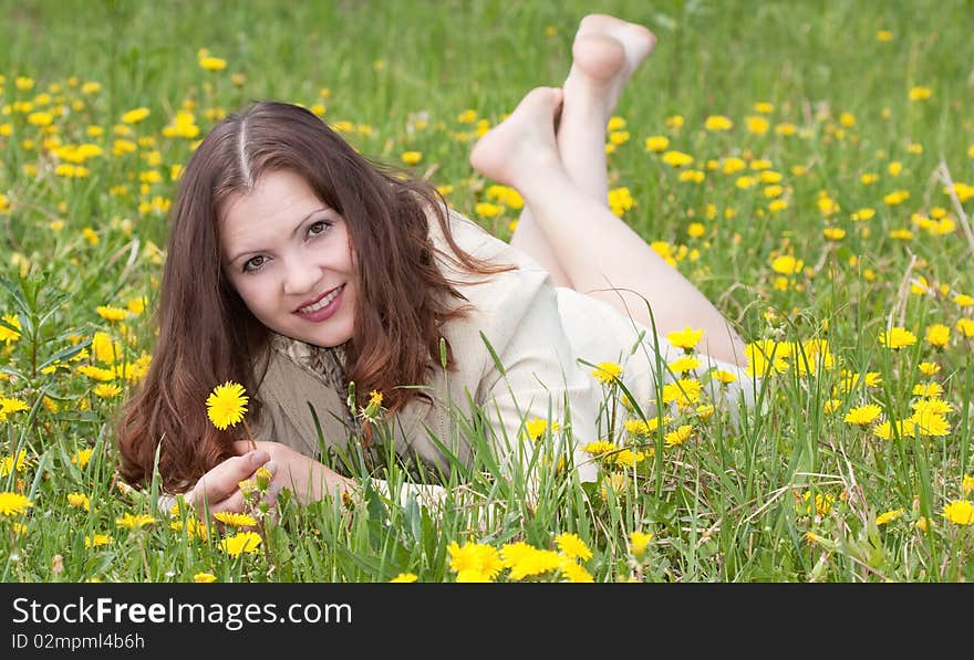 The young woman on the nature