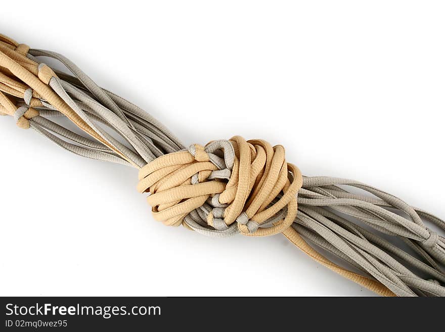 Rope with knot close up. Isolated on white background.