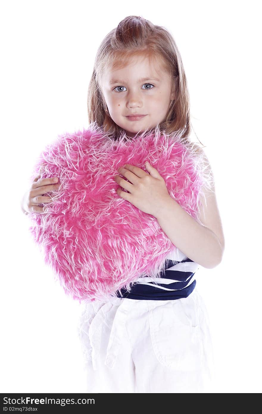 Beautiful baby with heart pink pillow on white background