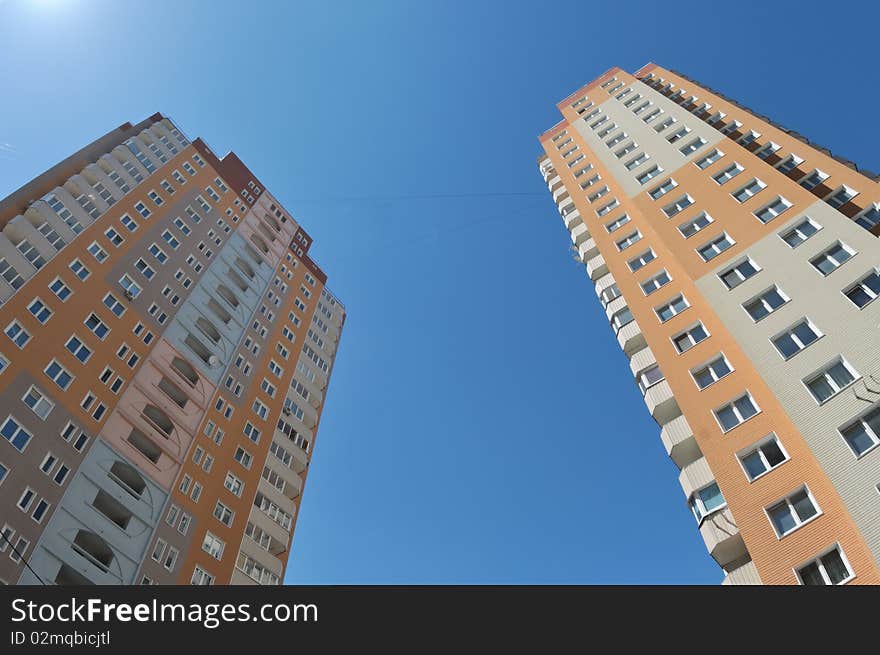 New residential houses against blue sky. New residential houses against blue sky