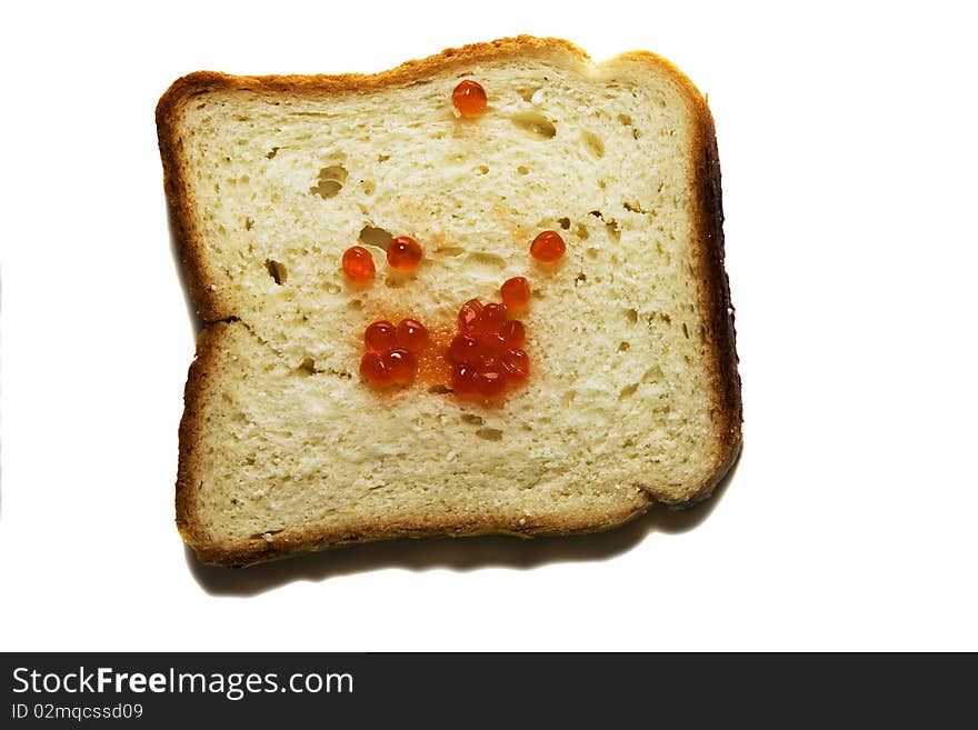 Some grains the calves located on a piece of a white loaf. Some grains the calves located on a piece of a white loaf