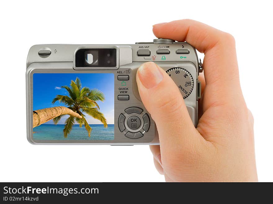 Hand with camera and landscape (my photo) isolated on white background