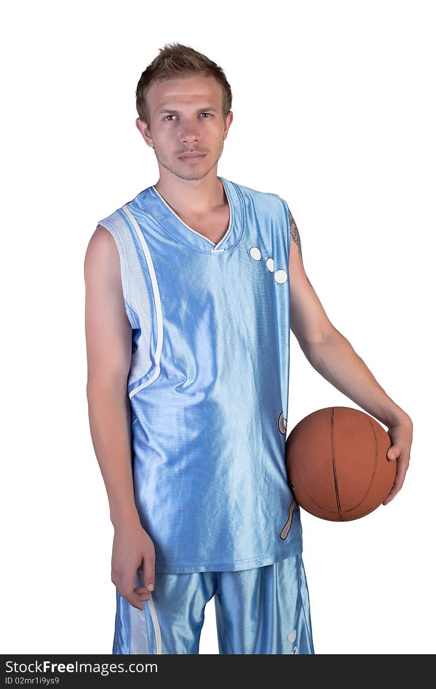 Basketball player posing with ball in hand on a white background. Basketball player posing with ball in hand on a white background