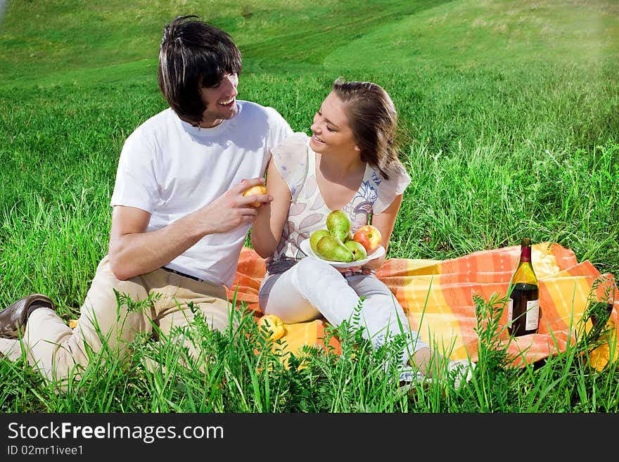 Boy and beautiful girl with fruits. Boy and beautiful girl with fruits