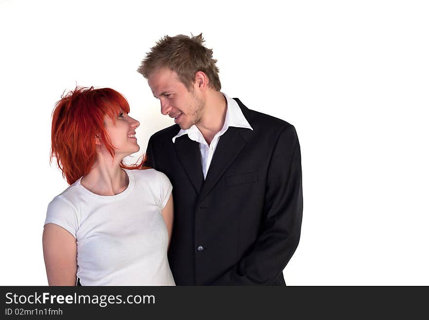 Boy and girl posing on a white background. Boy and girl posing on a white background