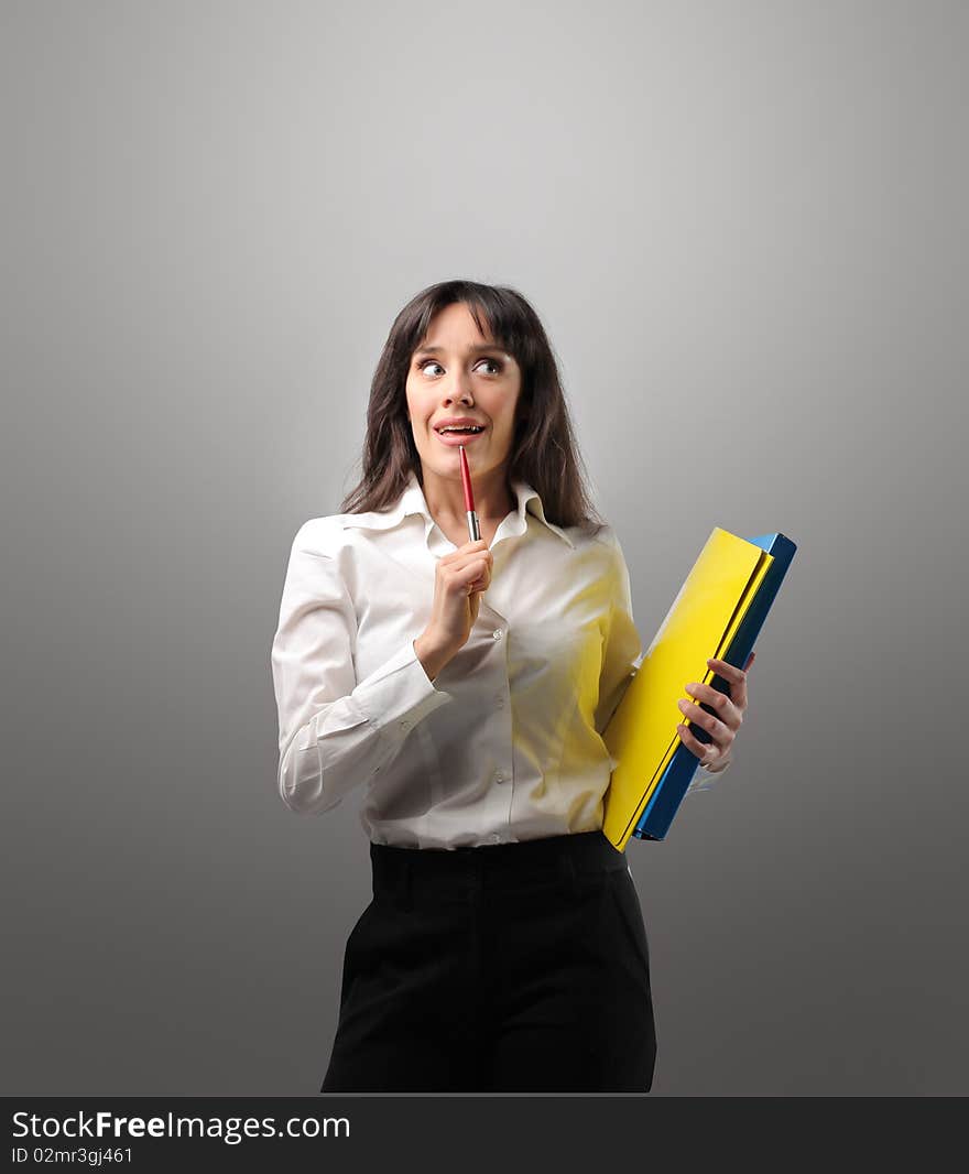 Young businesswoman having an idea. Young businesswoman having an idea